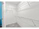 Walk-in closet featuring ample wire shelving and tile flooring at 2995 Woodberry Ct., Little River, SC 29566