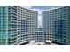 Breathtaking aerial view of a high-rise condominium with multiple balconies and a luxurious pool area at 304 North Ocean Blvd. # 506, North Myrtle Beach, SC 29582