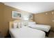 A full view of the bedroom with two beds and decorative art hanging over each bed at 304 North Ocean Blvd. # 506, North Myrtle Beach, SC 29582
