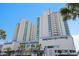 A full view of the Avista Resort exterior with many rooms and blue skies at 304 North Ocean Blvd. # 506, North Myrtle Beach, SC 29582