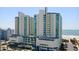 A full view of the Avista Resort with parking and view of the ocean in North Myrtle Beach at 304 North Ocean Blvd. # 506, North Myrtle Beach, SC 29582