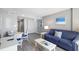 Living room with a sofa, television, and dining table at 304 North Ocean Blvd. # 506, North Myrtle Beach, SC 29582