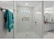 Modern bathroom with sleek glass shower, marble tile, and convenient inset shelving at 322 Canyon Dr., Conway, SC 29526