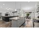 Bright open floor plan with an island kitchen that includes stainless steel appliances and granite countertops at 322 Canyon Dr., Conway, SC 29526