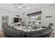 Comfortable living room featuring a large window view of the pool and a large television at 322 Canyon Dr., Conway, SC 29526
