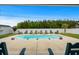 Backyard featuring a refreshing in-ground pool surrounded by well-placed lounge chairs at 322 Canyon Dr., Conway, SC 29526