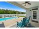 Outdoor pool and patio area with lush trees, perfect for relaxation and entertaining at 322 Canyon Dr., Conway, SC 29526