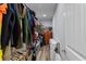 Organized walk-in closet featuring ample storage with shelves and hanging racks at 322 Canyon Dr., Conway, SC 29526