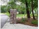 The address number is displayed on a decorative brick column near the street, adding character to the entrance at 329 Kaufman St., Georgetown, SC 29440