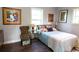 Bedroom with a bright window, hardwood floors, and decorative pillows at 329 Kauffman St., Georgetown, SC 29440