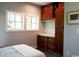 Walk-in closet with wooden shelves and drawers at 329 Kauffman St., Georgetown, SC 29440
