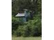 Charming home surrounded by lush greenery, offering a private and secluded setting, perfect for nature lovers at 329 Kaufman St., Georgetown, SC 29440