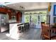 Bright kitchen with wood cabinets, stainless appliances, marble island and many windows at 329 Kaufman St., Georgetown, SC 29440