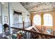 Bright living room features a unique painted ceiling, with large arched windows that let in ample natural light at 329 Kaufman St., Georgetown, SC 29440