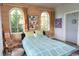 Bright main bedroom with wood paneling and lots of natural light at 329 Kauffman St., Georgetown, SC 29440