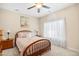 Cozy bedroom with a floral-themed bed set, natural light, and bedside tables at 4 Stillwater Ct., Murrells Inlet, SC 29576