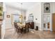 Elegant dining room with hardwood floors, a decorative light fixture, and ample space for entertaining guests at 4 Stillwater Ct., Murrells Inlet, SC 29576