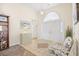Welcoming foyer featuring tiled flooring, a decorative rug, high ceilings and plenty of room for furniture at 4 Stillwater Ct., Murrells Inlet, SC 29576