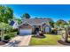Charming single-story brick home with an attached garage, manicured lawn, and mature landscaping at 4 Stillwater Ct., Murrells Inlet, SC 29576
