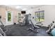 Well-equipped gym with modern exercise machines and natural light at 4 Stillwater Ct., Murrells Inlet, SC 29576
