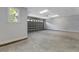 A spacious two car garage with sealed concrete floors and an abundance of natural light at 4120 Whatuthink Rd., Myrtle Beach, SC 29588