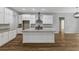Modern kitchen with white cabinets, stainless steel appliances, and granite countertops, a chef's dream at 4120 Whatuthink Rd., Myrtle Beach, SC 29588