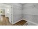 A spacious walk-in closet with wood-look flooring and custom adjustable wire shelving provides ample storage at 4120 Whatuthink Rd., Myrtle Beach, SC 29588