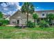 Spacious backyard with patio and lush greenery, ideal for outdoor entertaining at 4294 Rivergate Ln., Little River, SC 29566