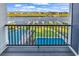 Enjoy relaxing on this balcony with beautiful views of the canal, boat docks, and community pools at 437 Saint Julian Ln., Myrtle Beach, SC 29579
