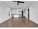 Open kitchen and living area featuring stainless steel appliances and hardwood floors at 437 Saint Julian Ln., Myrtle Beach, SC 29579
