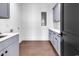 A bright laundry room features custom cabinets, and ample counter space at 437 Saint Julian Ln., Myrtle Beach, SC 29579