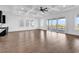 Living room with coffered ceilings, fireplace, luxury wet bar, and sliding glass doors to the deck at 437 Saint Julian Ln., Myrtle Beach, SC 29579