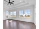Bright main bedroom featuring a ceiling fan, recessed lighting, white walls and trim, and access to a balcony at 437 Saint Julian Ln., Myrtle Beach, SC 29579