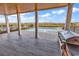 Entertain easily with this outdoor kitchen, pool, and water views at 437 Saint Julian Ln., Myrtle Beach, SC 29579
