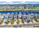 An aerial view of waterfront neighborhood houses with well-manicured lawns at 441 Saint Julian Ln., Myrtle Beach, SC 29579