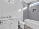 Modern bathroom features a gray-tiled accent wall and sleek fixtures at 441 Saint Julian Ln., Myrtle Beach, SC 29579