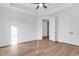 A well-lit bedroom features tray ceiling, beautiful hardwood floors and a closet at 441 Saint Julian Ln., Myrtle Beach, SC 29579
