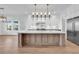 Gorgeous kitchen with a large center island, pendant lighting, and stainless steel appliances at 441 Saint Julian Ln., Myrtle Beach, SC 29579