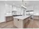 Well-lit kitchen with a large island, stainless steel appliances, and a marble backsplash at 441 Saint Julian Ln., Myrtle Beach, SC 29579