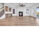 Open-concept living room with a fireplace, built-in wet bar and views at 441 Saint Julian Ln., Myrtle Beach, SC 29579