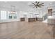 Open-concept living room and kitchen with luxury finishes and ample space at 441 Saint Julian Ln., Myrtle Beach, SC 29579