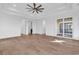 Bright living room with hardwood floors, recessed lighting, and access to a private balcony at 441 Saint Julian Ln., Myrtle Beach, SC 29579