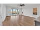 A spacious living room with sliding glass doors and beautiful hardwood floors at 441 Saint Julian Ln., Myrtle Beach, SC 29579