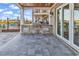 Covered outdoor kitchen featuring a built-in grill and ample counter space at 441 Saint Julian Ln., Myrtle Beach, SC 29579