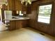 Functional kitchen featuring retro style cabinets, a sink, and an eat-in bar at 444 Davis Rd., Hemingway, SC 29554