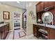 Bathroom features a vanity with dark wood cabinets and a makeup station with storage at 4803 Bucks Bluff Dr., North Myrtle Beach, SC 29582