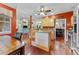 Open kitchen with granite countertops, wood cabinets, and views to the living area at 4803 Bucks Bluff Dr., North Myrtle Beach, SC 29582