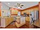 Functional kitchen featuring granite countertops, stainless steel appliances, and wooden cabinetry at 4803 Bucks Bluff Dr., North Myrtle Beach, SC 29582
