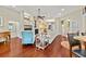 Spacious living room featuring a fireplace, built-in shelving, and hardwood floors at 4803 Bucks Bluff Dr., North Myrtle Beach, SC 29582