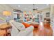 Bright, open living room with hardwood floors, comfortable seating, and ample natural light at 4803 Bucks Bluff Dr., North Myrtle Beach, SC 29582